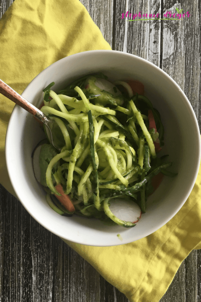 This Green Goddess Zucchini Noodle Bowl is light, fresh, and ready in just 10 minutes with 4 ingredients! #dairyfree #veganbowl #greengoddess