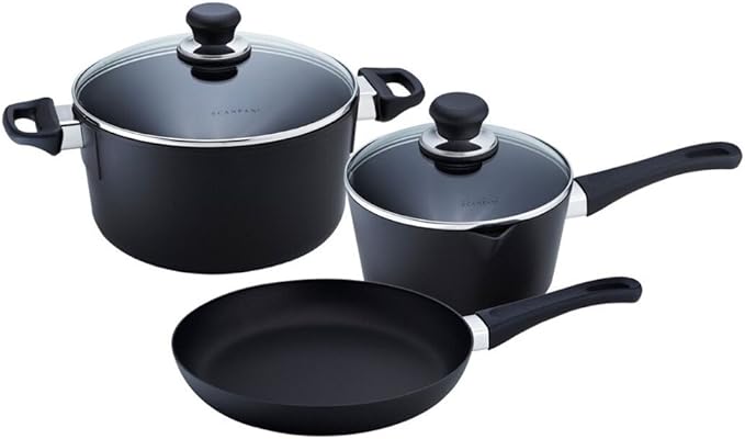 two pots with lids and a frying pan