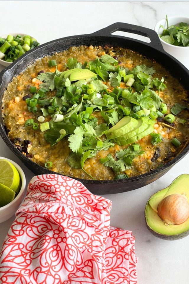 Enchilada skillet surrounded by the ingredients